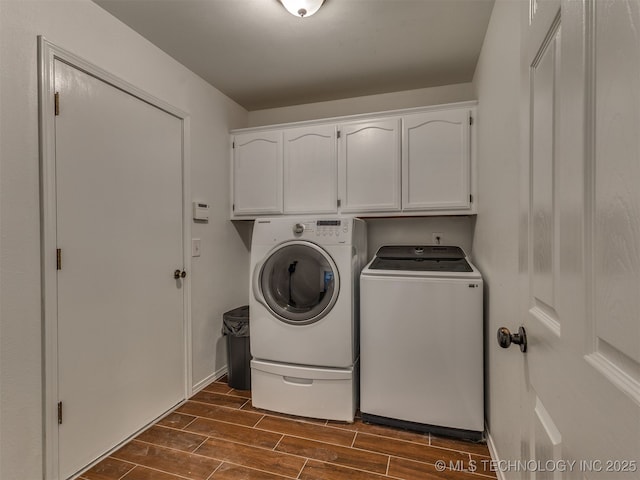 4004 S Sycamore Ave, Broken Arrow, OK 74011 - laundry room featuring cabinet space, washing machine and clothes dryer, and wood tiled floors