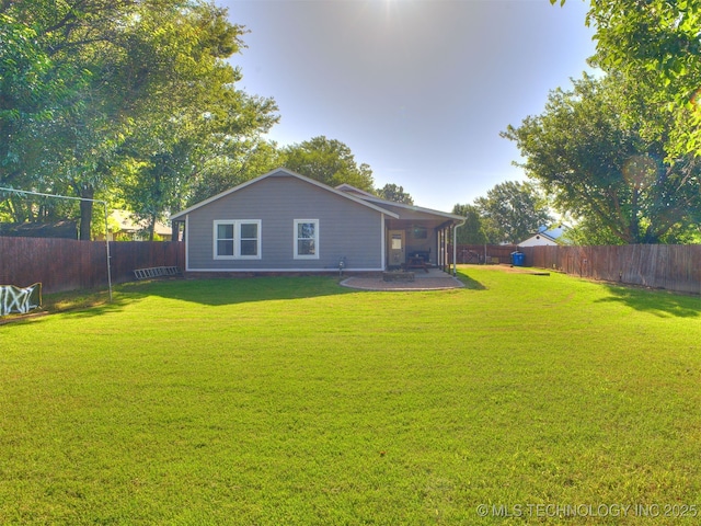 4004 S Sycamore Ave, Broken Arrow, OK 74011 - rear view of house featuring a fenced backyard and a patio area