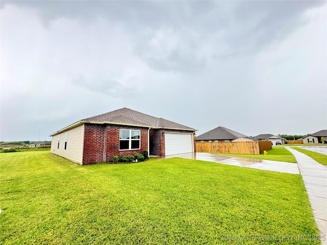 3907 S 150th E Ave, Tulsa, OK 74134 - ranch-style house featuring brick siding, concrete driveway, and an attached garage
