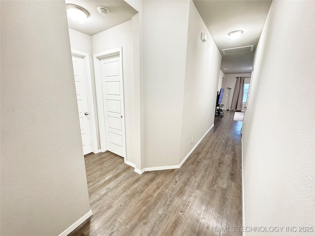 3907 S 150th E Ave, Tulsa, OK 74134 - hall with wood finished floors and baseboards