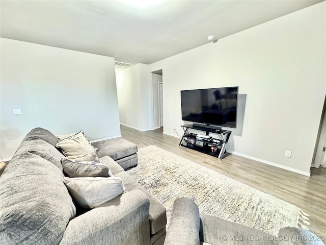 3907 S 150th E Ave, Tulsa, OK 74134 - living area featuring wood finished floors