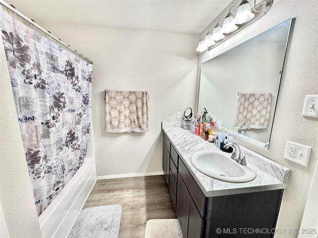 3907 S 150th E Ave, Tulsa, OK 74134 - bathroom with vanity, wood finished floors, and shower / bath combo
