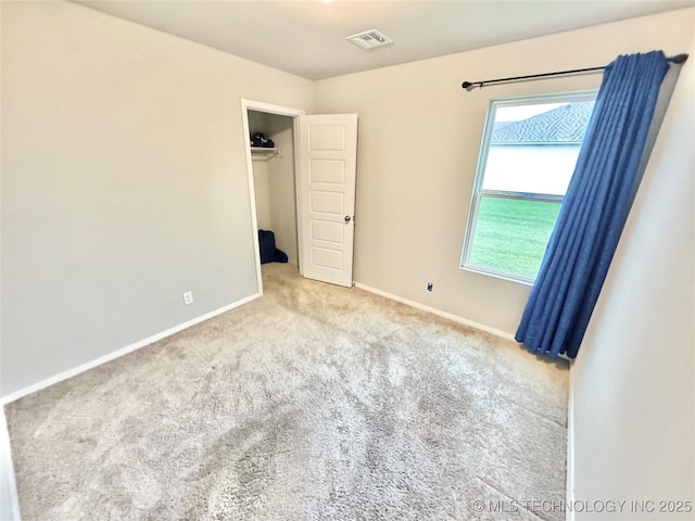 3907 S 150th E Ave, Tulsa, OK 74134 - unfurnished bedroom featuring carpet flooring and a spacious closet