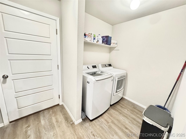 3907 S 150th E Ave, Tulsa, OK 74134 - laundry area featuring separate washer and dryer and light wood-style flooring