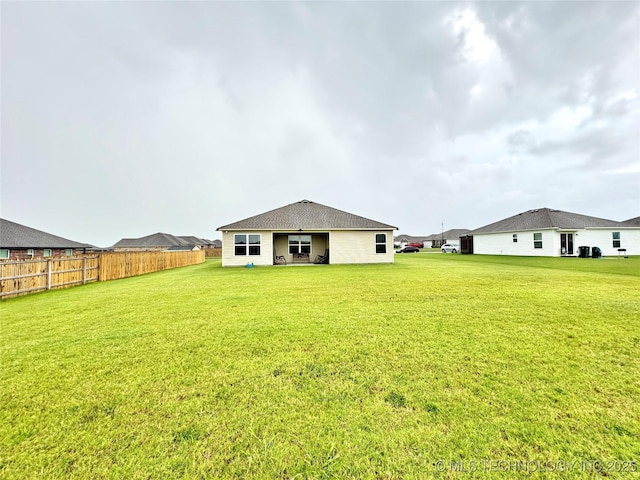 3907 S 150th E Ave, Tulsa, OK 74134 - back of property with a patio area
