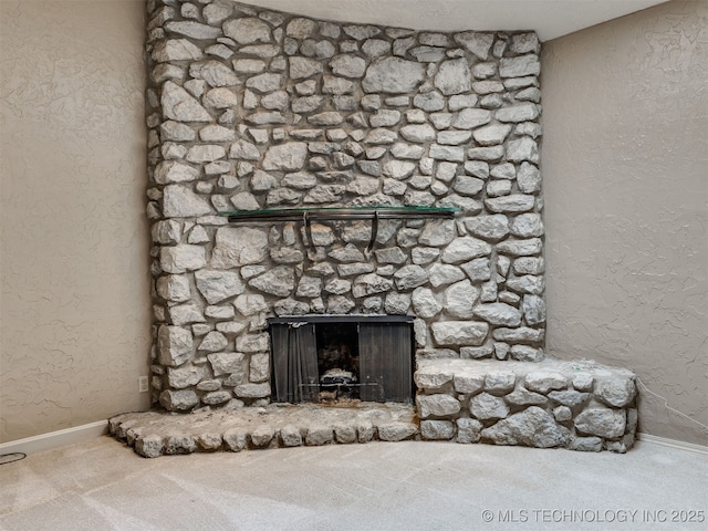 5704 E 65th St, Tulsa, OK 74136 - detailed view of carpet and a stone fireplace