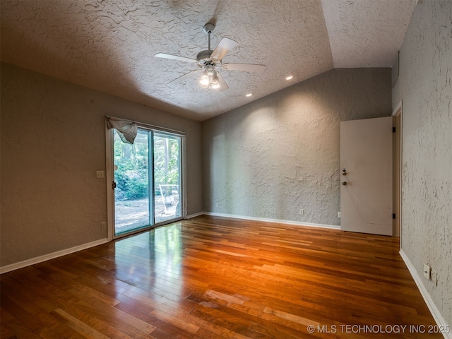 5704 E 65th St, Tulsa, OK 74136 - spare room with vaulted ceiling, hardwood / wood-style floors, a textured wall, a textured ceiling, and a ceiling fan