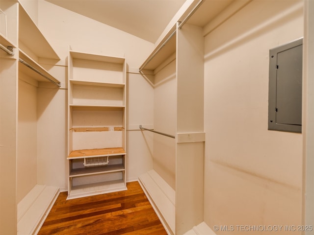 5704 E 65th St, Tulsa, OK 74136 - spacious closet with electric panel and wood finished floors