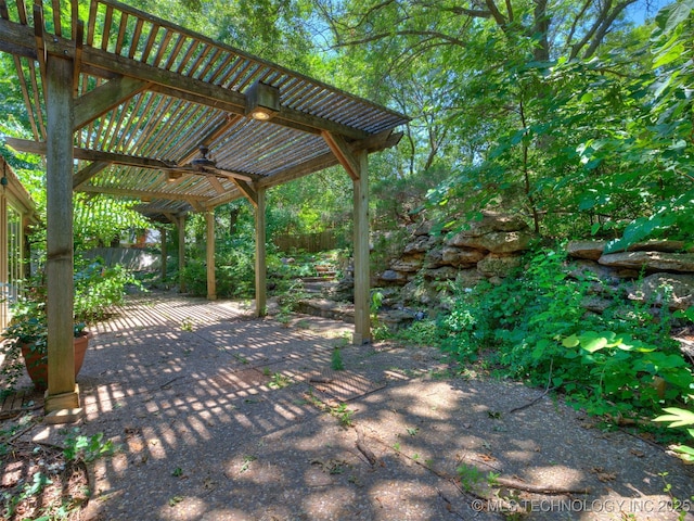 5704 E 65th St, Tulsa, OK 74136 - view of patio featuring ceiling fan and a pergola