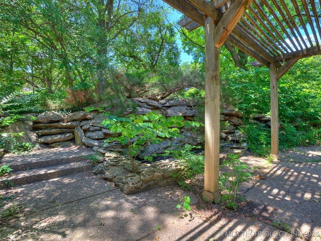 5704 E 65th St, Tulsa, OK 74136 - view of patio featuring a pergola