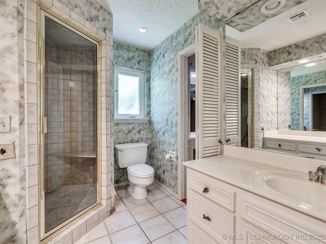 5704 E 65th St, Tulsa, OK 74136 - full bath with vanity, tile patterned flooring, wallpapered walls, a shower stall, and a textured ceiling