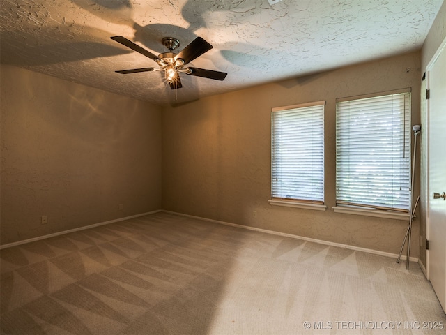 5704 E 65th St, Tulsa, OK 74136 - unfurnished room featuring a ceiling fan, light colored carpet, and a textured ceiling