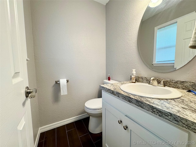 1404 Compelube Rd, Mcalester, OK 74501 - bathroom featuring vanity and wood finished floors