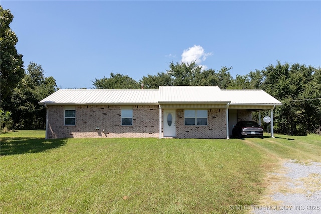 1404 Compelube Rd, Mcalester, OK 74501 - ranch-style house with a carport, a front lawn, driveway, a metal roof, and brick siding