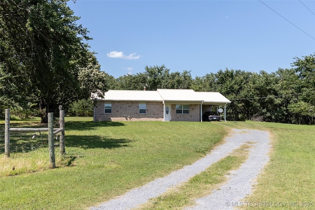 1404 Compelube Rd, Mcalester, OK 74501 - ranch-style house featuring driveway, brick siding, and a carport
