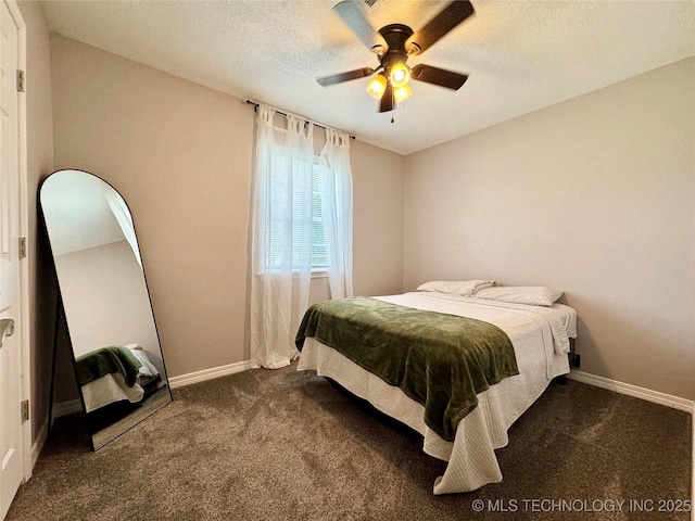 1404 Compelube Rd, Mcalester, OK 74501 - bedroom with dark colored carpet, ceiling fan, and a textured ceiling