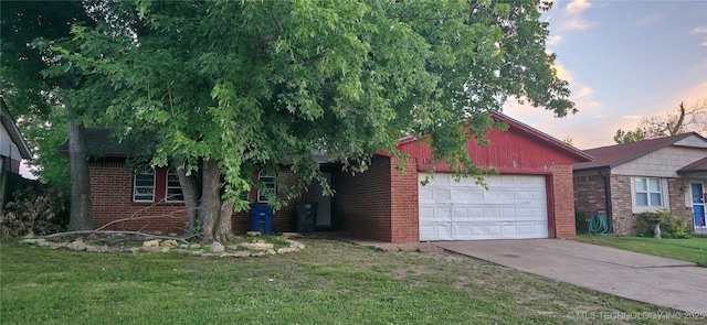 12416 E 15th St S, Tulsa, OK 74128 - view of front of house with a garage, brick siding, concrete driveway, and a lawn