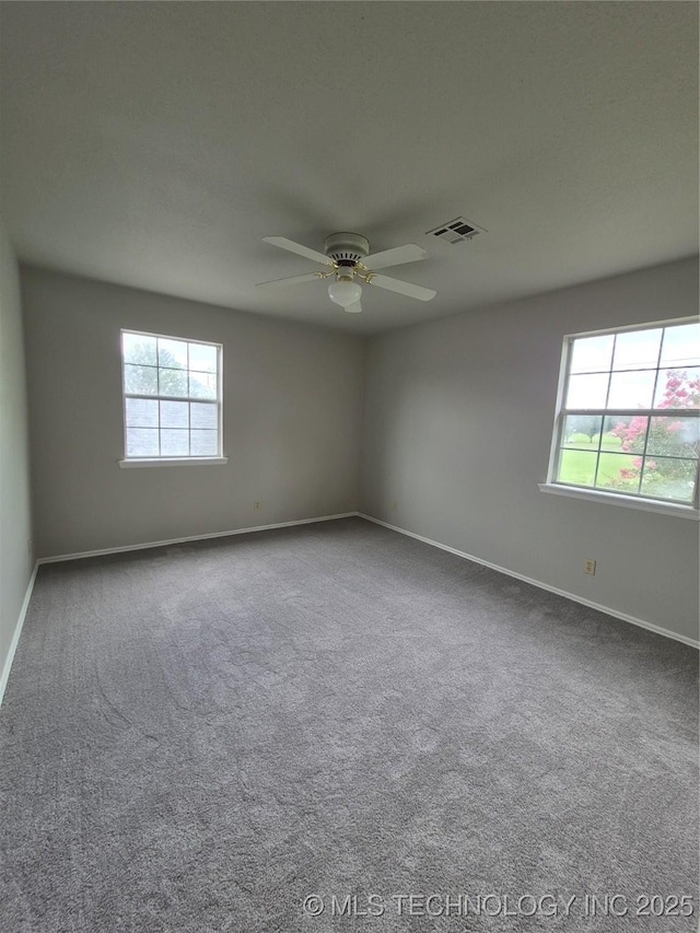2200 SW Wolf Run Ct, Claremore, OK 74019 - spare room with ceiling fan and carpet