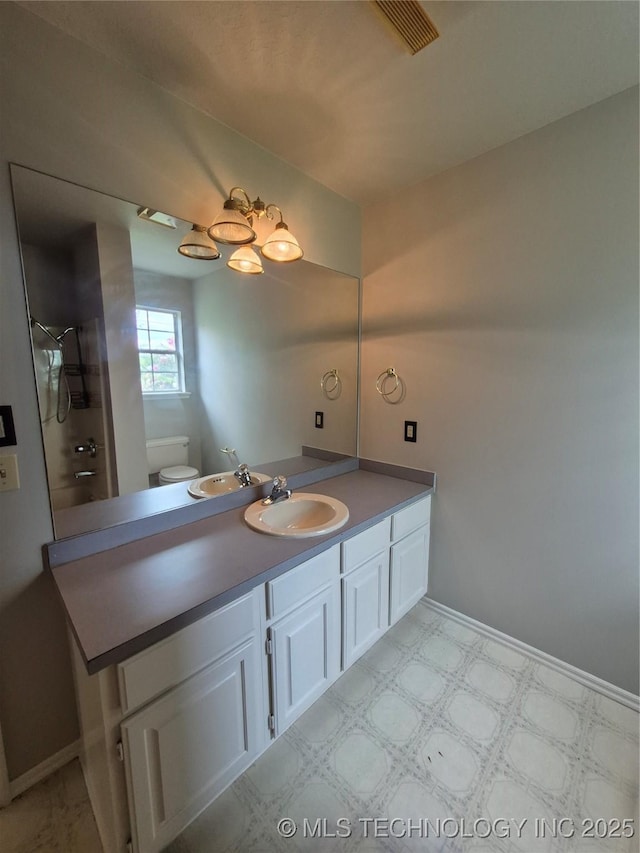2200 SW Wolf Run Ct, Claremore, OK 74019 - full bath featuring vanity, tile patterned floors, and a shower