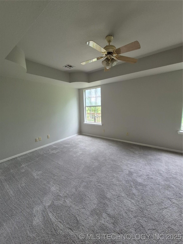 2200 SW Wolf Run Ct, Claremore, OK 74019 - carpeted empty room with ceiling fan and baseboards
