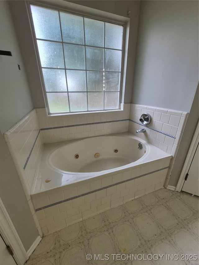 2200 SW Wolf Run Ct, Claremore, OK 74019 - full bath featuring a tub with jets and tile patterned floors