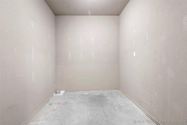 1317 W Dover St, Broken Arrow, OK 74012 - unfurnished room featuring unfinished concrete floors and baseboards