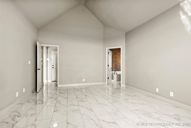 1317 W Dover St, Broken Arrow, OK 74012 - spare room featuring light marble finish flooring and high vaulted ceiling