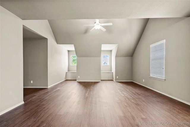 1317 W Dover St, Broken Arrow, OK 74012 - bonus room with dark wood-style flooring, lofted ceiling, and a ceiling fan