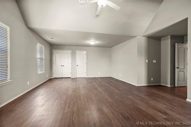 1317 W Dover St, Broken Arrow, OK 74012 - unfurnished living room featuring dark wood finished floors, ceiling fan, and vaulted ceiling