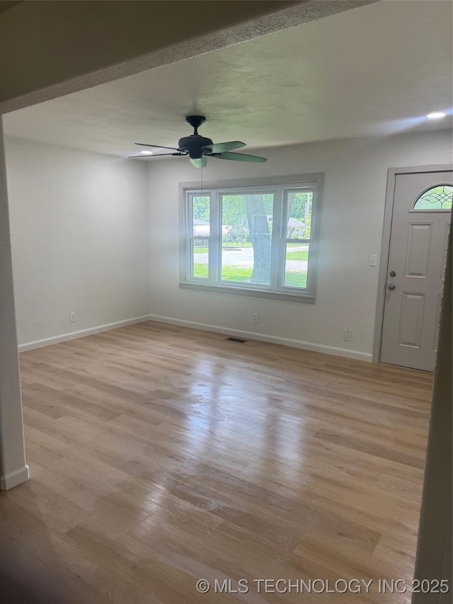 115 S Bryan St, Sperry, OK 74073 - spare room with a ceiling fan and light wood finished floors