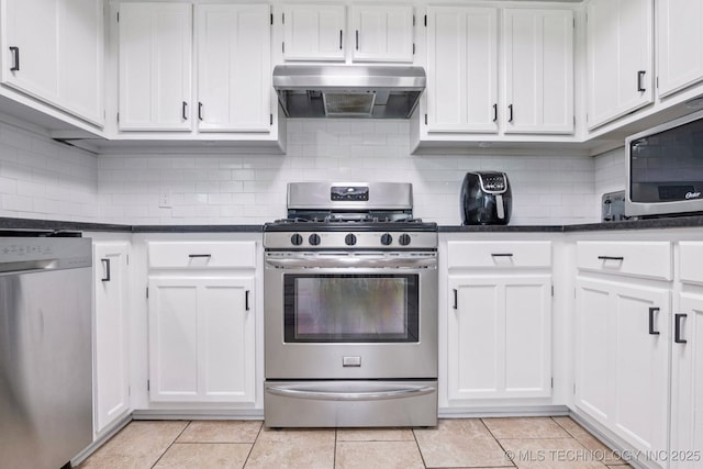 11784 N 154th Ave, Collinsville, OK 74021 - kitchen with stainless steel appliances, range hood, and white cabinets