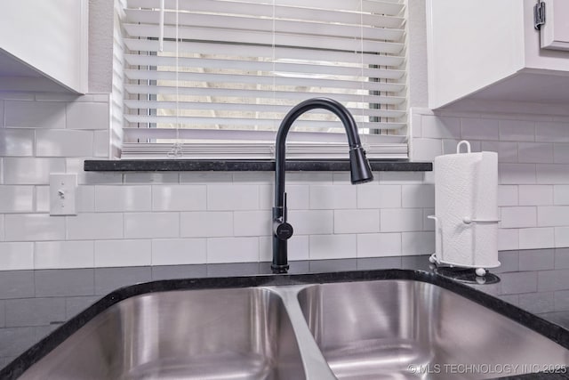 11784 N 154th Ave, Collinsville, OK 74021 - kitchen view of a sink and tasteful backsplash