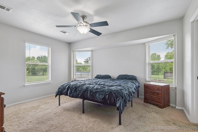 11784 N 154th Ave, Collinsville, OK 74021 - bedroom with light carpet and ceiling fan