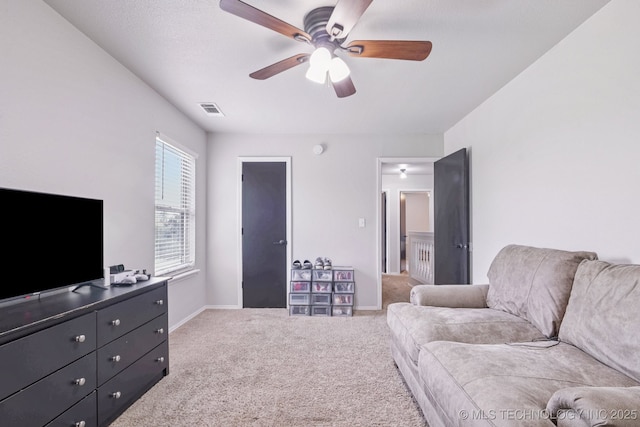 11784 N 154th Ave, Collinsville, OK 74021 - living room featuring carpet flooring and a ceiling fan