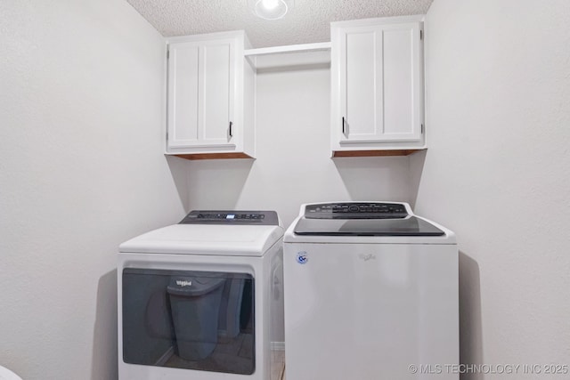 11784 N 154th Ave, Collinsville, OK 74021 - washroom featuring separate washer and dryer, cabinet space, and a textured ceiling