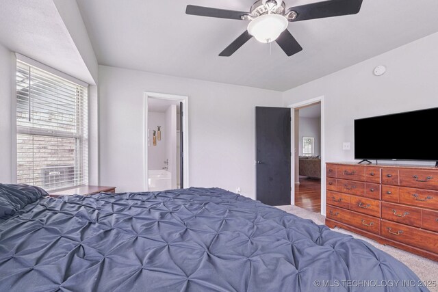 11784 N 154th Ave, Collinsville, OK 74021 - bedroom with ceiling fan and connected bathroom