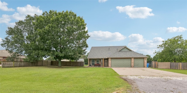 11784 N 154th Ave, Collinsville, OK 74021 - view of front of home with concrete driveway, a garage, brick siding, and a shingled roof