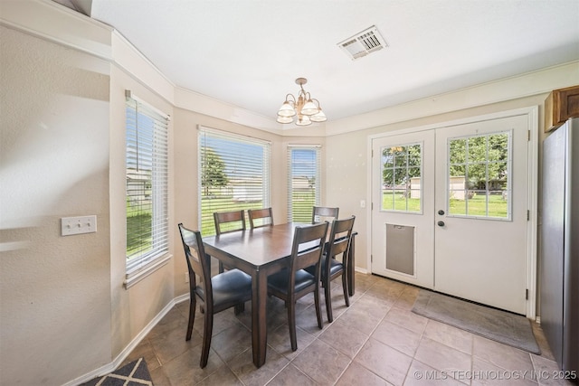 11691 N 193rd E Ave, Collinsville, OK 74021 - dining room with a chandelier, light tile patterned flooring, and french doors