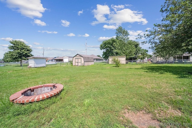 11691 N 193rd E Ave, Collinsville, OK 74021 - view of yard featuring a shed and a fire pit