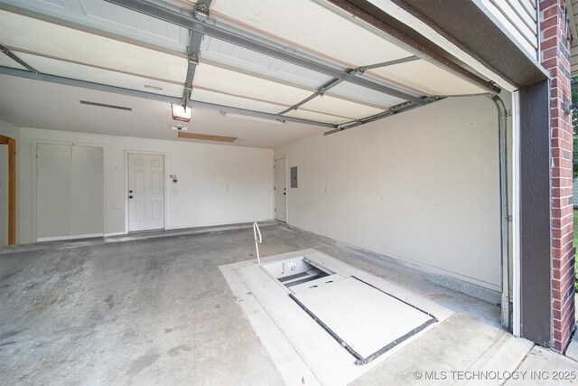 11691 N 193rd E Ave, Collinsville, OK 74021 - garage featuring a garage door opener
