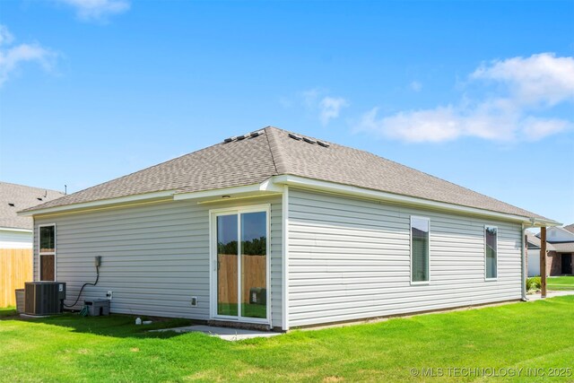 11608 S 274th E Pl, Coweta, OK 74429 - rear view of property with a lawn and a shingled roof