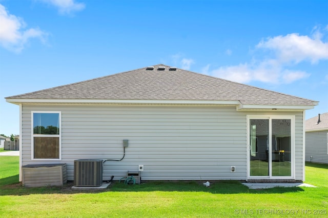 11608 S 274th E Pl, Coweta, OK 74429 - rear view of house with a shingled roof and a lawn