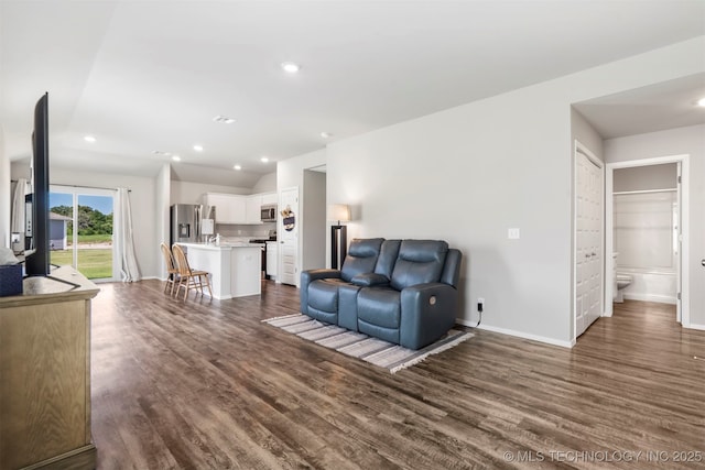 11608 S 274th E Pl, Coweta, OK 74429 - living room with dark wood-type flooring, vaulted ceiling, and recessed lighting