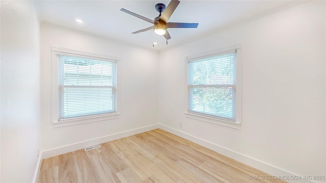 403 N Vine Ave, Cleveland, OK 74020 - empty room with healthy amount of natural light, light wood-style flooring, ceiling fan, and recessed lighting