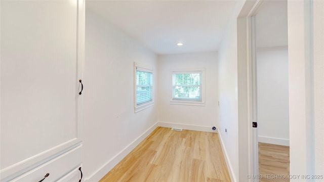 403 N Vine Ave, Cleveland, OK 74020 - hall with light wood finished floors and recessed lighting