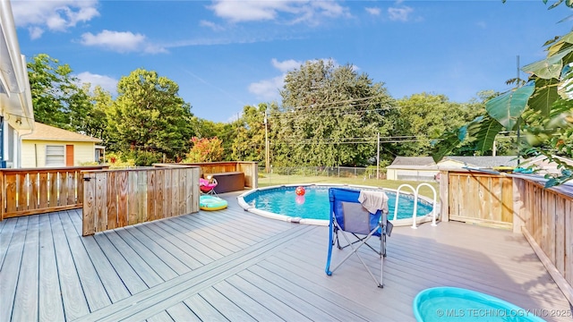 403 N Vine Ave, Cleveland, OK 74020 - view of pool with a deck and a fenced backyard