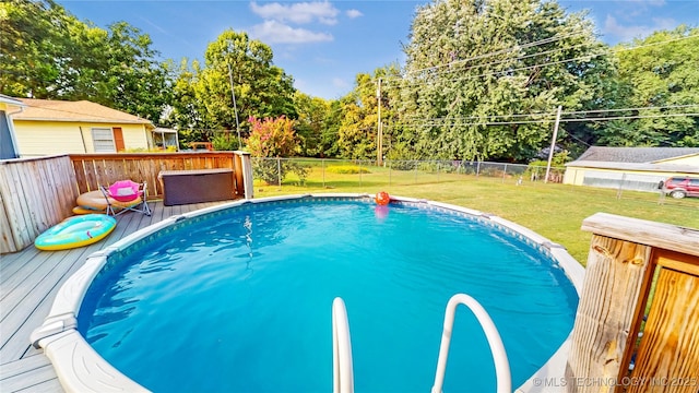 403 N Vine Ave, Cleveland, OK 74020 - view of swimming pool featuring a fenced backyard and a deck