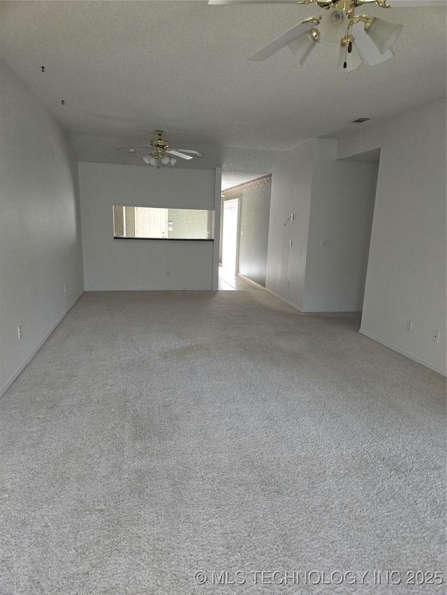 8302 E 84th St, Tulsa, OK 74133 - spare room featuring light carpet and a ceiling fan