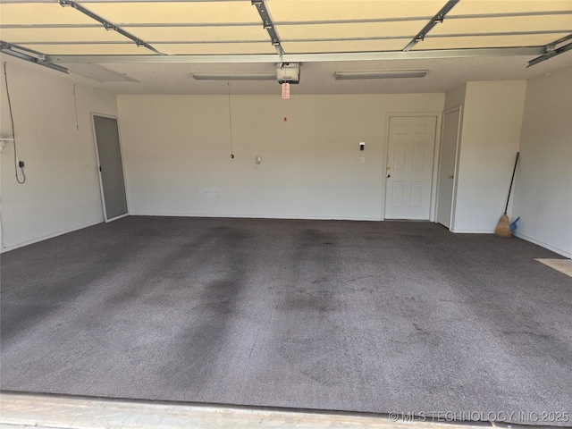 8302 E 84th St, Tulsa, OK 74133 - garage with a garage door opener