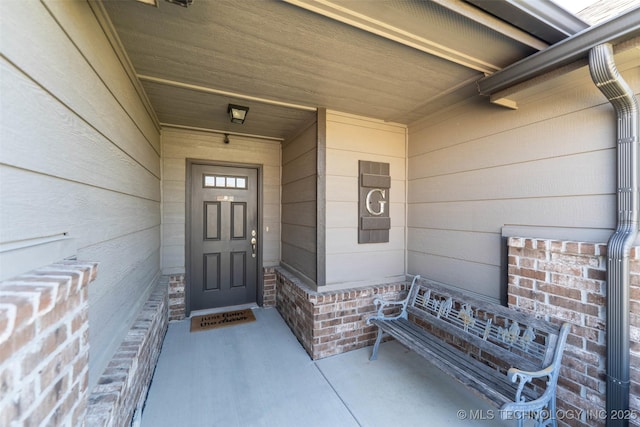 11105 N 145th E Pl, Owasso, OK 74055 - view of exterior entry with a porch
